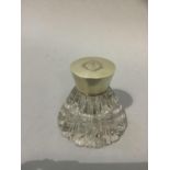 A silver lidded glass ink well, London 1903 of panelled conical shape, initialled to the top, 9cm
