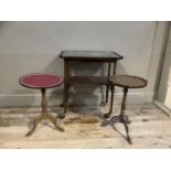 A mahogany two tier occasional table on castors, two tripod occasional tables