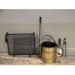 A brass and copper coal bucket together with brass shovel and poker, a reproduction black fire guard