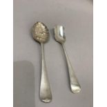 Silver cheese scoop, Sheffield 2000, Millennium mark, approximate weight 2oz and a berry spoon,