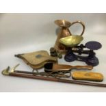 A copper measure, pair of weighing scales with brass pan, pair of bellows, antler handled crop,