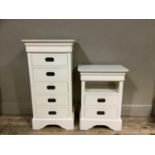 A cream finished chest of five drawers with recessed handles on shaped bracket feet together with