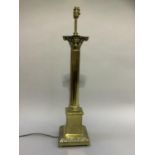 A brass Corinthian column table lamp on square base, 74cm high