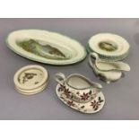 A Woods ivory ware ten piece fish service including salmon platter, eight plates and a sauce boat