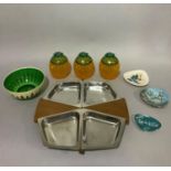 A 1970's set of three plastic pineapple ice buckets labelled Malibu together with a teak and