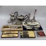 A quantity of silver plated ware including plated on copper candlesticks, EPNS teapot and hot