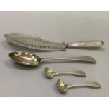 An early silver fish slice with later repairs and silver handle together with a 19th century foreign
