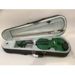 A student's violin, the case finished in green, with case and bow