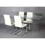 A glass dining table, rectangular, on two 'V' shaped refectory supports together with a set of