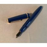 A Parker Duofold in blue, M.S, 14k nib stamped 35, 14cm long