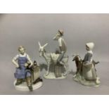 Two Lladro figure groups, boy and a donkey 28cm and girl with goat 22cm and a Lladro style figure of