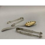 Two pairs of sugar tongs, 18th century, Edinburgh together with silver gilt berry spoon,