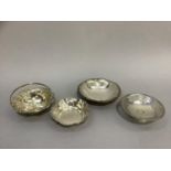 Four early to mid 20th century bon bon dishes in Continental .800 silver, three with German