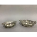 Two early to mid 20th century strawberry dishes in Continental .800 silver, both of pierced oval
