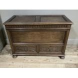 A Victorian mule chest having a twin indented panel lift up top with arcaded frieze above a plain