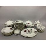 A Czechoslovakian china dinner service decorated with roses comprising plates in three sizes, meat