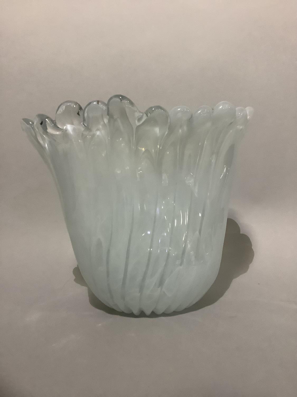 A white swirl and clear glass vase of petalated form and oval outline, 26cm high