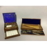 A late 19th/early 20th century artists mahogany paint box by Rowney fitted with ceramic palettes and