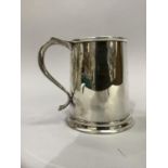 A silver tankard presented by the Whitebread & Co Ltd with occupying inscription to S Neale in