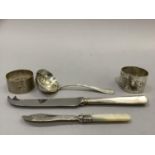 A silver spoon with divided bowl, George V, London 1931, approximate weight 1.5oz, two silver