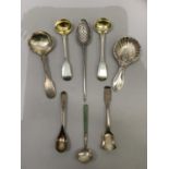 Silver condiment spoons and two caddy spoons, various, including a pair of York mustard spoons, mote