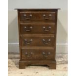 A reproduction chest of four graduated drawers on bracket feet, 43cm wide x 63cm,