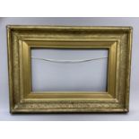 A 19th century gilt picture frame, 51cm by 71cm outer measurement, inner measures 26cm by 46cm