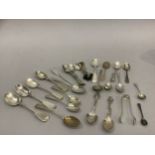 Some 22 various Georgian, Victorian and later silver teaspoons, a butter knife, five bean handled