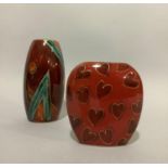 Two vases by Anita Harris, Valentine vase of disc form decorated with hearts in red and gilt