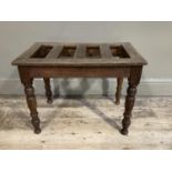 An oak and elm luggage stand with slatted top on turned legs, 61cm x 38cm