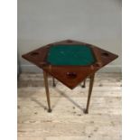 An Edwardian mahogany and boxwood line inlaid envelope card table, lined with baise and with counter