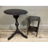 A dark stain oval pedestal table on tripod base together with a small occasional table with