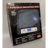 A Stellar portable induction hob, in original box