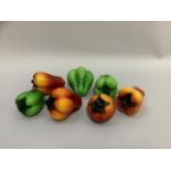 Seven Murano glass peppers and tomato, 12cm long to 8cm
