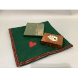 Bridge playing: a card box containing two packs of cards, a Harrods bridge set of score sheets,