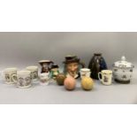 A Royal Doulton character jug, Isaac Walton, large size, and two other toby jugs, three ceramic