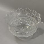 A Waterford glass fruit bowl on pedestal foot, 26cm diameter by 17.5cm high, small chip to rim