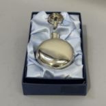 A silver hip flask by Carrs of Sheffield, circular outline, together with a matching silver funnel