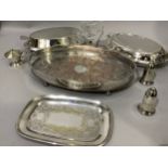 Two silver plated oval entrée dishes, an oval two-handled gallery tray, a brandy warmer with