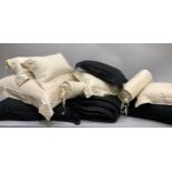 A Pratesi Italian pure cotton bed set comprising a king size throw, two large black cushions and one