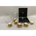 A boxed foie gras set, a cut glass biscuit barrel and cover, a cut glass fruit bowl on pedestal