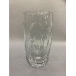 A large Waterford crystal flower vase, 35cm high by 19cm diameter (scratched)