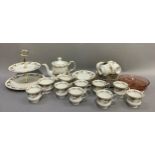 A Caprice tea service by Elizabethan China comprising twelve cups and saucers, milk and sugar,