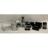 A quantity of black and chrome dressing table items including tissue box with a Chanel motif and a