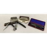 Two harmonicas by Hohner, one entitled Little Lady, a silver lidded cut glass pin tray, a pair of