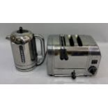 A Dualit three slice toaster with basket, together with a Dualit chrome finish electric kettle