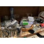 A collection of kitchen ware including cafetieres, water jugs, cruets, egg separator, mini grater,