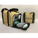 A Fortnum & Mason picnic set with cooler bag and an additional picnic set for four