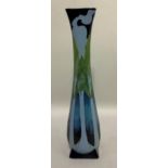 A Moorcroft vase of pine tree design on elongated body with everted square rim and on square foot,