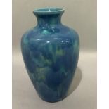 A Minton Hollins & Co vase of blue streaked glaze, printed mark to underside, 19.5cm high